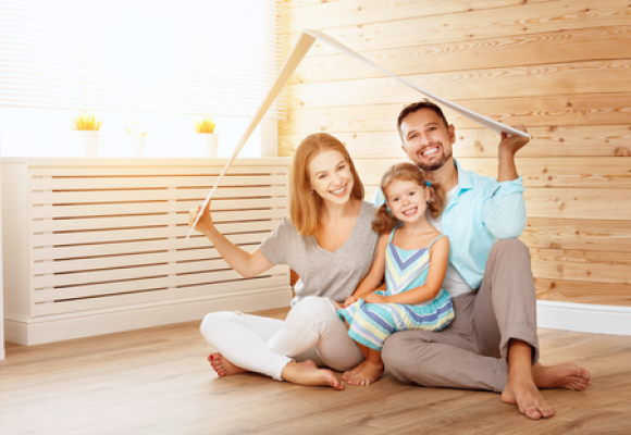 A happy young family enjoying peace of mind at home